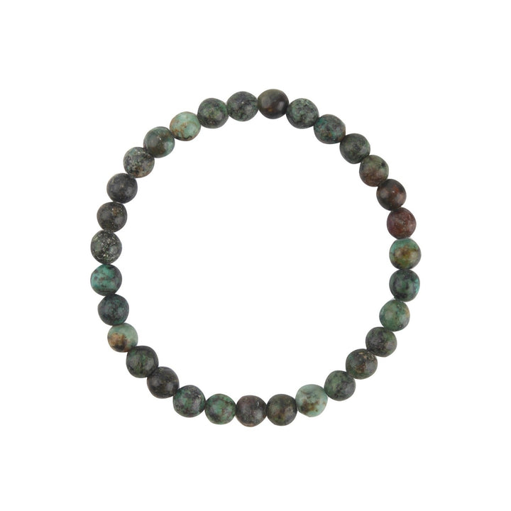 Close-up of a stretch style bracelet made with 6mm round african turquoise beads in shades of green, displayed on a white background.