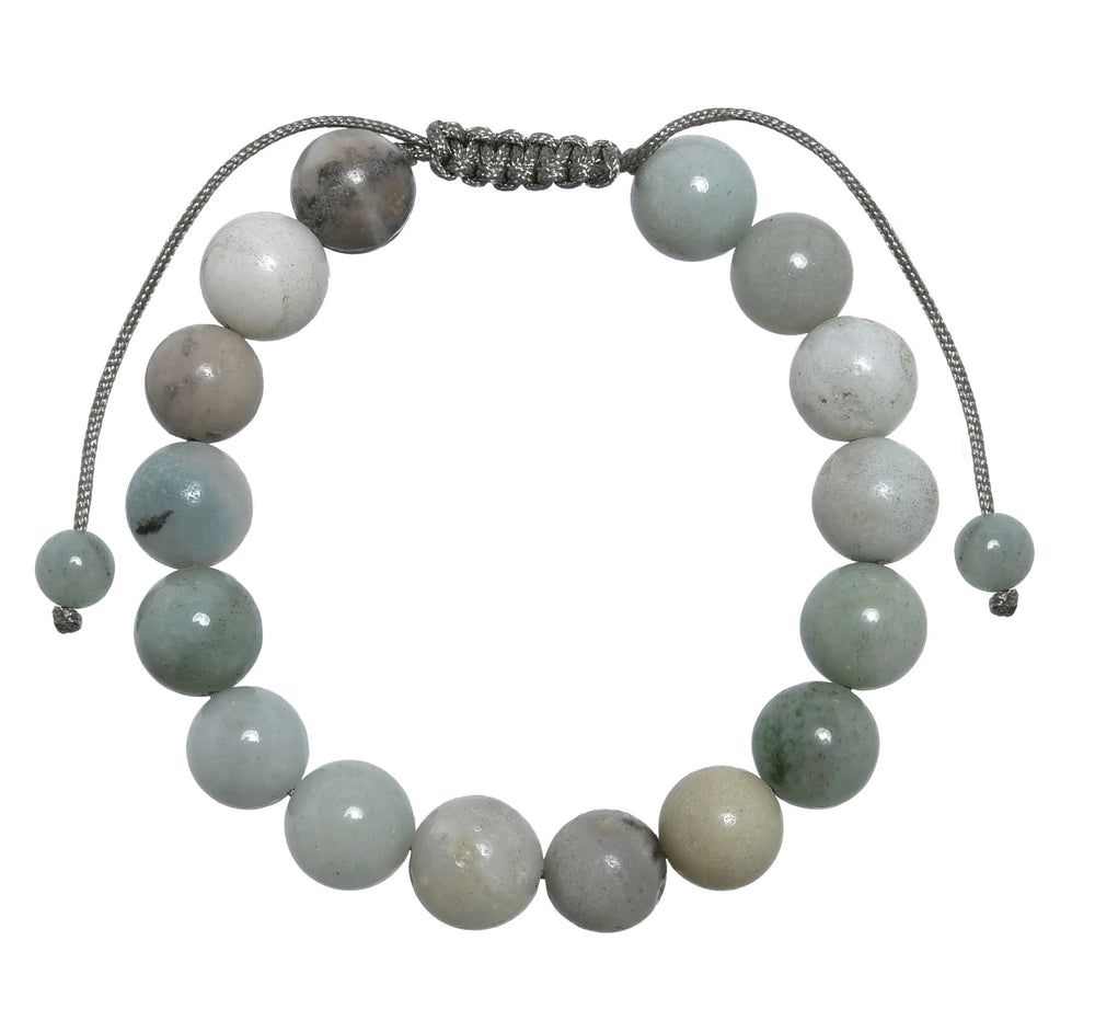 A close-up view of an amazonite bracelet, with 10mm round polished beads, in shades of white, gray, pale blue, and tan,  and a gray adjustable pull-tie closure, on a white background.