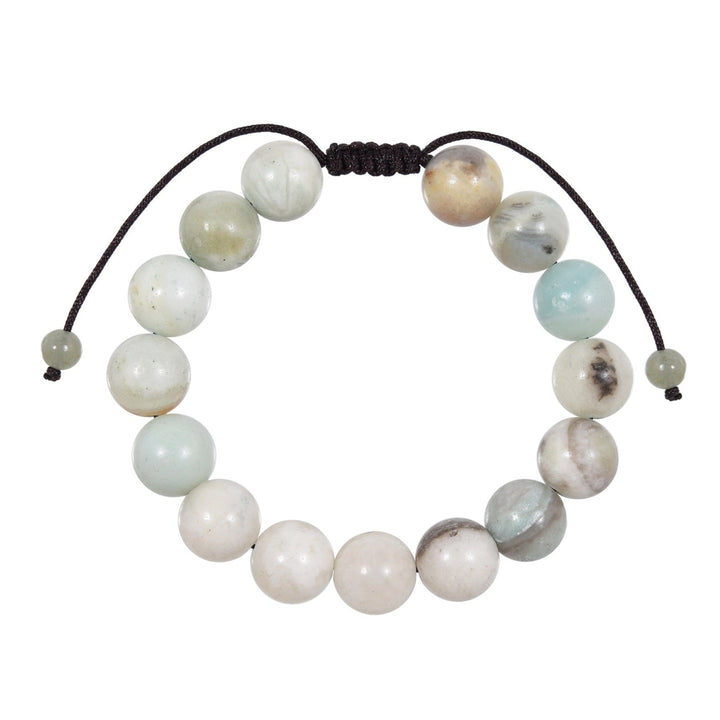 A close-up view of an amazonite bracelet, with 12mm round polished beads, in shades of white, gray, pale blue, and tan,  and a dark brown black adjustable pull-tie closure, on a white background.
