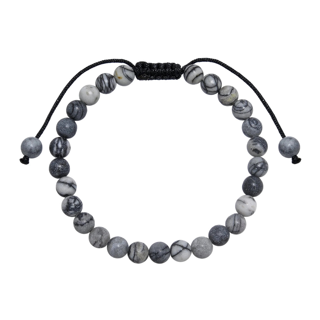 A close-up view of a black and gray network agate  bracelet, with 6mm round polished matte beads, and an adjustable pull-tie closure, on a white background.