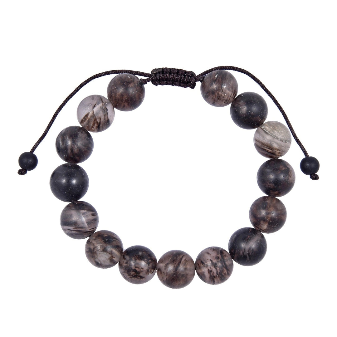 Close-up of a black watermelon quartz bracelet made with 12mm round beads with shades of gray colors, and a dark brown pull tie style cord closure, displayed on a white background.