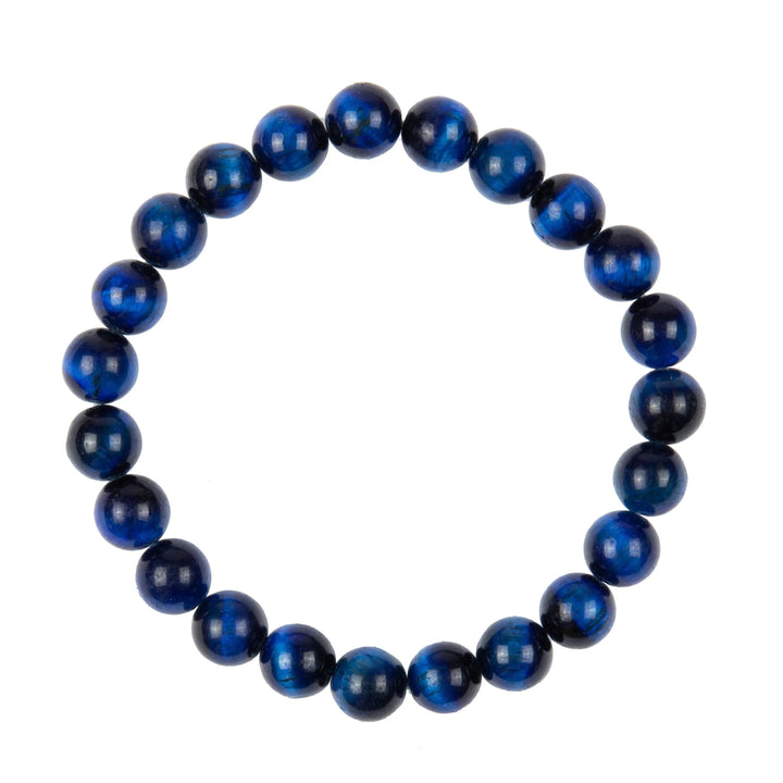 A close-up of a stretch bracelet made with 8mm round blue tigers eye beads connected with a clear stretch cord, on a white background.