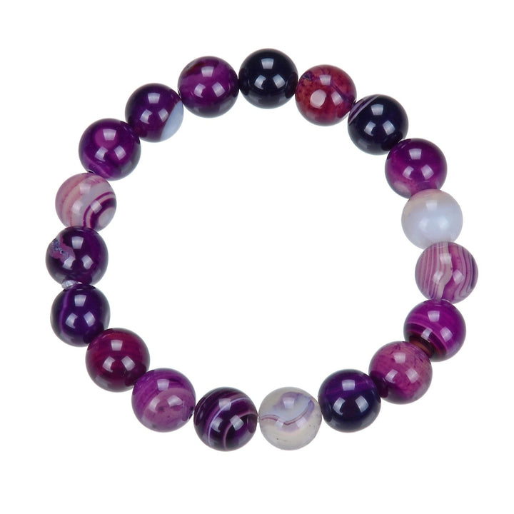 A purple beaded bracelet made with a stretch cord and 10mm dog teeth amethyst polished beads in shades of purple and white, displayed on a white background.
