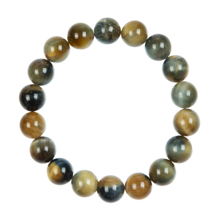 Close-up of a stretch style bracelet made with round 10mm Dream Tiger's Eye beads, with varying shades of green and tan, strung on a clear stretch cord.