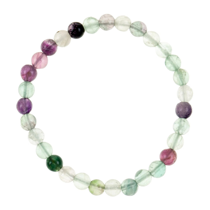 A close-up of a flourite stone stretch style bracelet with round 6mm flourite beads, in shades of green, purple and white; on a white background.