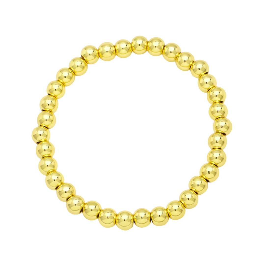 A gold-colored hematite bead bracelet with a stretch style design on a white background.