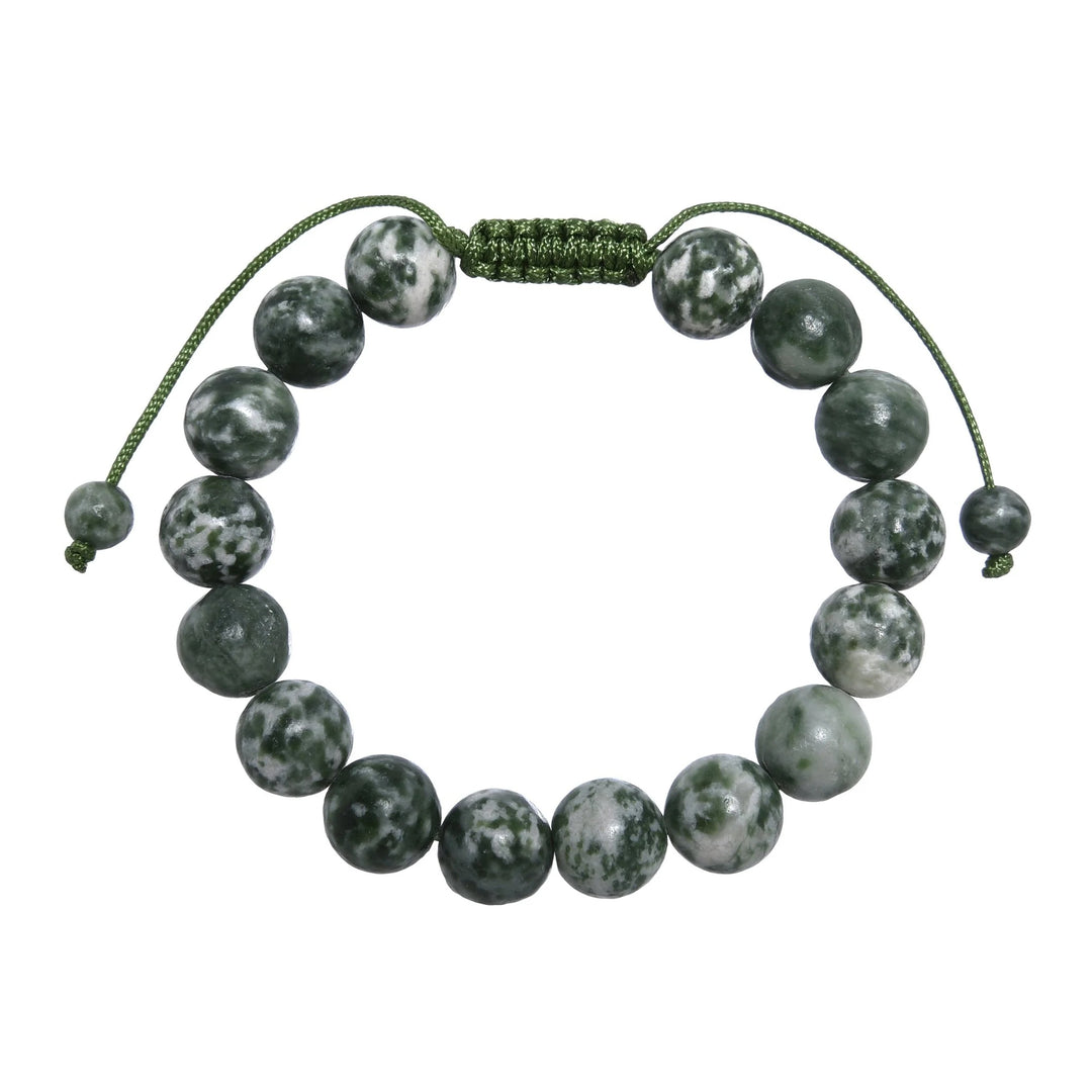 Close-up of a greenspot jasper bracelet made with 10mm round polished green and white spotted jasper beads, with a green pull tie style cord closure, displayed on a white background.