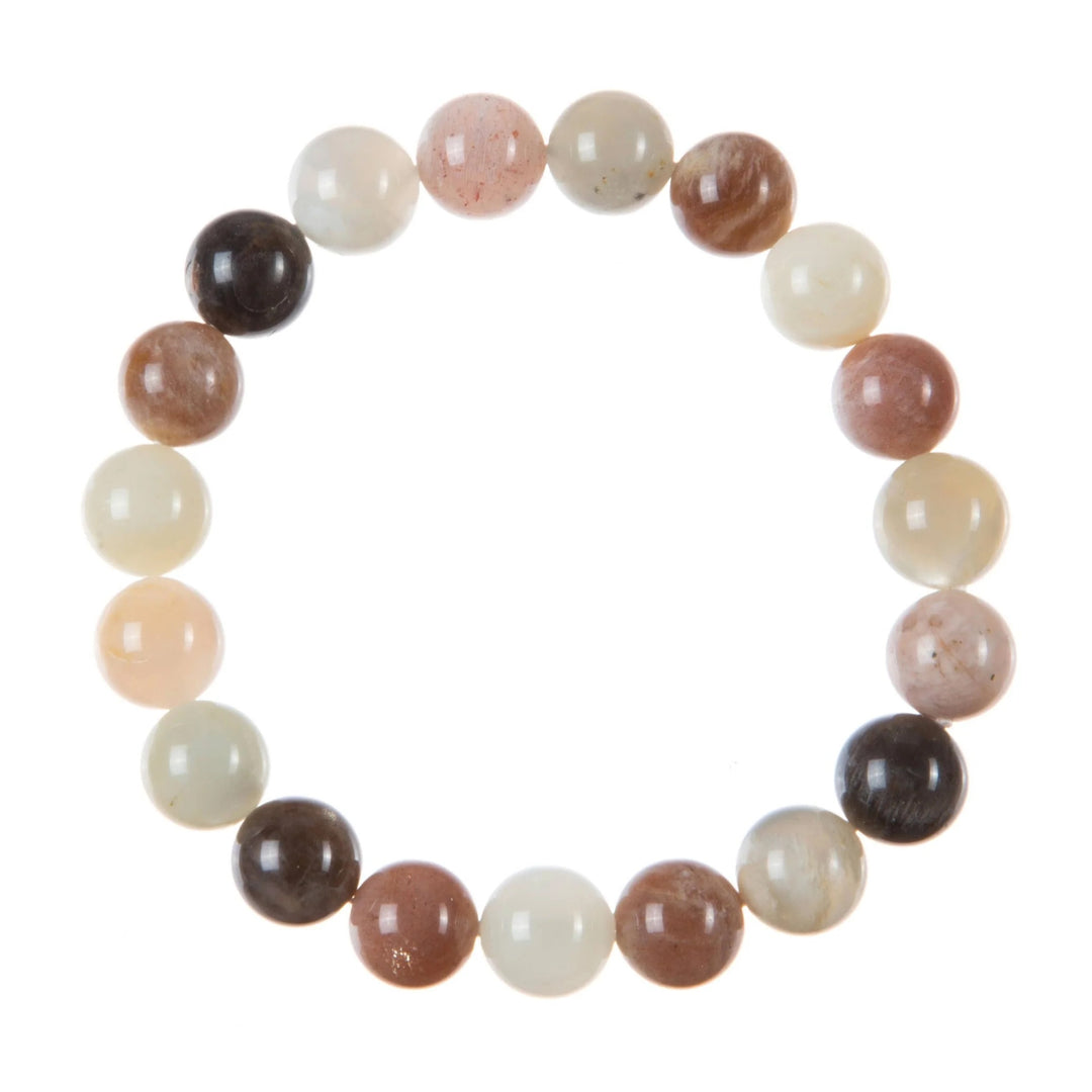 A close-up of a bracelet made with 10mm round mixed moonstone beads in shades of peach, white, and gray, connected with a clear stretch cord, on a white background.