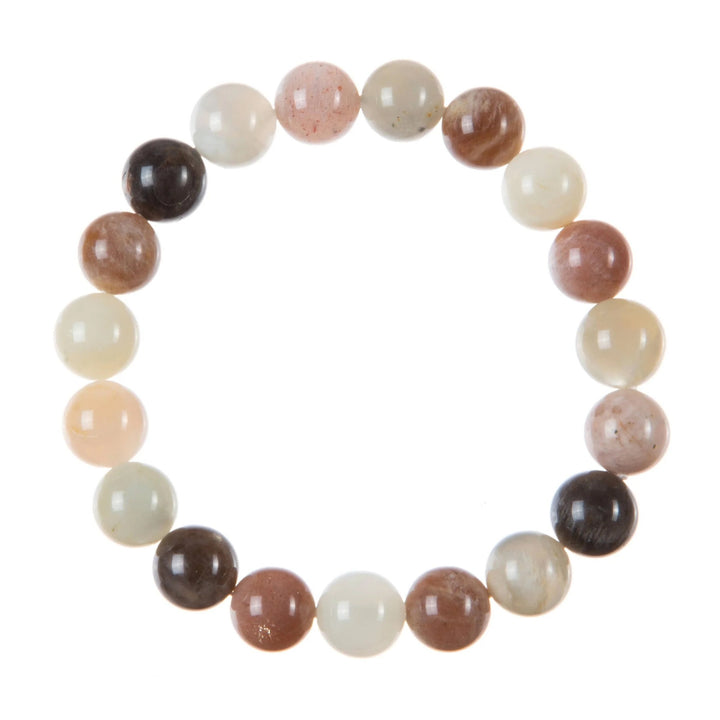 A close-up of a bracelet made with 10mm round mixed moonstone beads in shades of peach, white, and gray, connected with a clear stretch cord, on a white background.