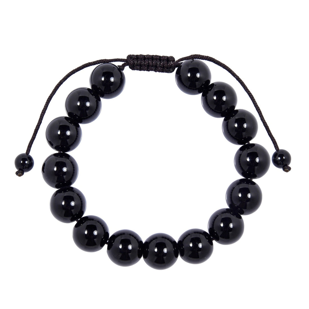 Close-up of a glossy black onyx bracelet made with polished 12mm round black beads and a dark brown pull tie style cord closure, displayed on a white background.