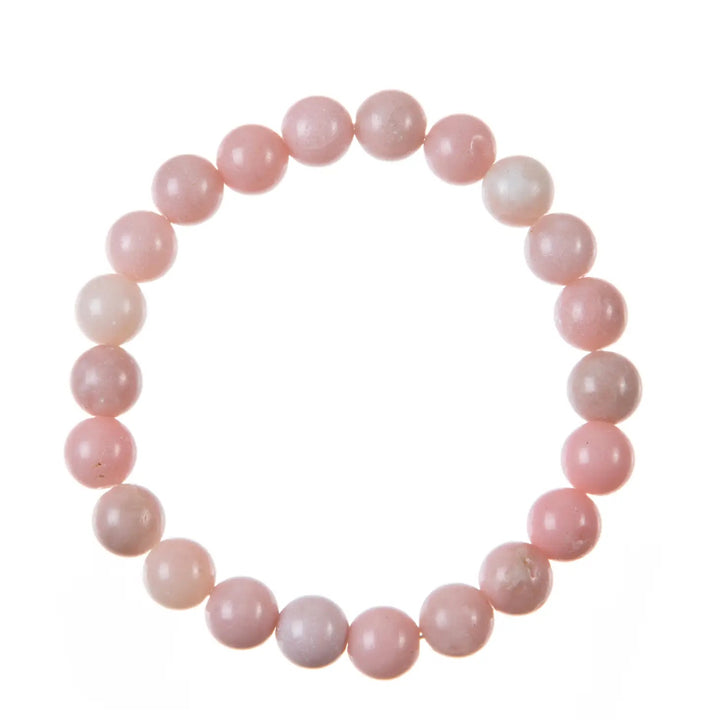 Close-up of a bracelet made with pink opal stone 8mm beads on a stretch cord, displayed against a white background.