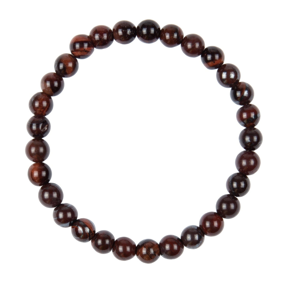 Close-up of a stretch style bracelet made with 6mm round polished red tiger's eye beads in shades of reddish brown,  displayed on a white background.
