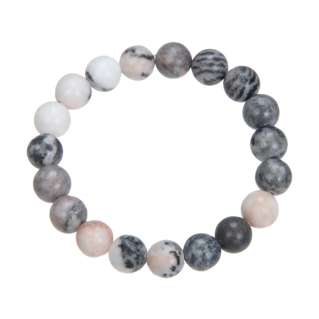 Close-up of a rhodonite stone bracelet made with 10mm round rhodonite beads in shades of pink and gray, connected with a clear stretch cord, displayed on a white background.