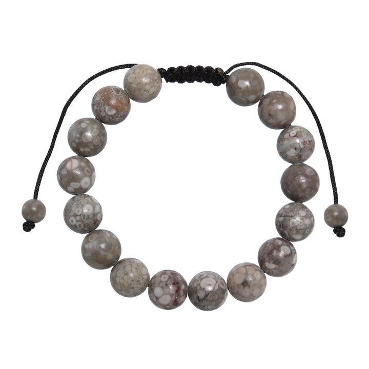 Close-up of a tree agate bracelet made with 10mm round beads with shades of gray and tan colors, and a dark brown black pull tie style cord closure, displayed on a white background.