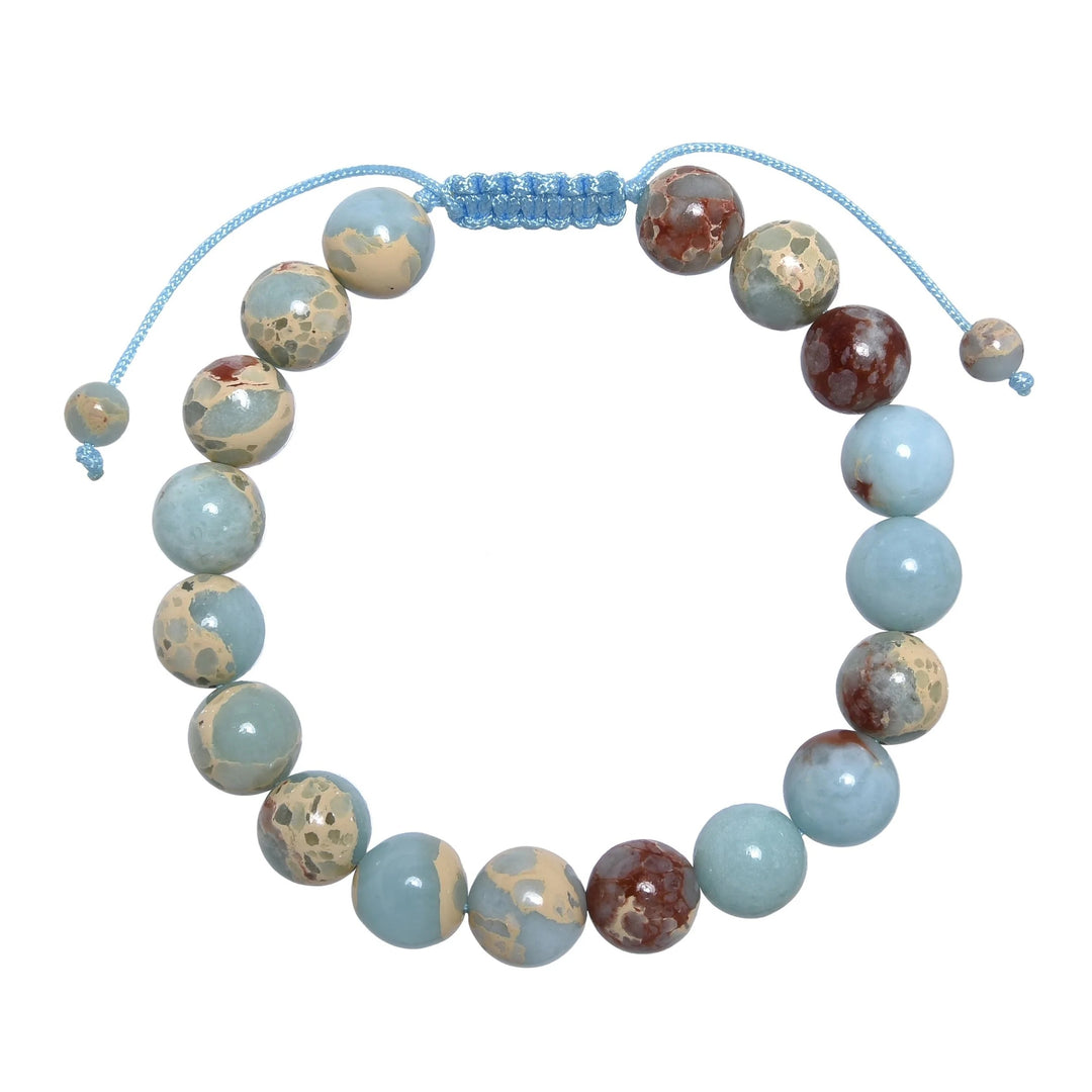 Close-up of a shoushan stone bracelet made with 10mm round polished beads with shades of light blue colors, tan, red, and cream, and a blue pull tie style cord closure, displayed on a white background.