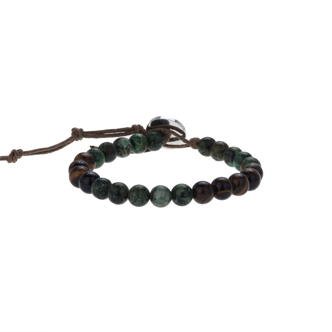 Close-up of a bead bracelet made with 6mm tiger's eye and african turquoise beads, in sahdes of brown, green, and black, strung on an adjustable brown cord, with a silver color button closure, displayed on a white background.