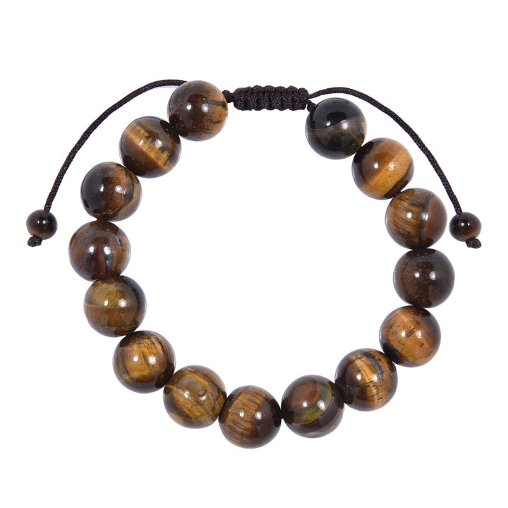 Close-up of a tiger's eye bracelet made with 12mm polished round beads with shades of brown, and a dark brown pull tie style cord closure, displayed on a white background.