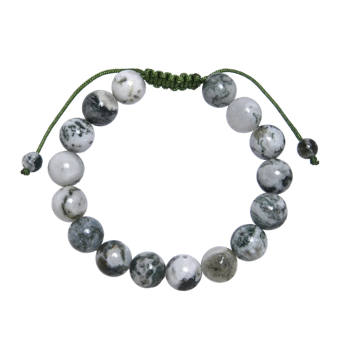 Close-up of a tree agate bracelet made with 10mm round beads with shades of green, gray, and white colors, and a green pull tie style cord closure, displayed on a white background.