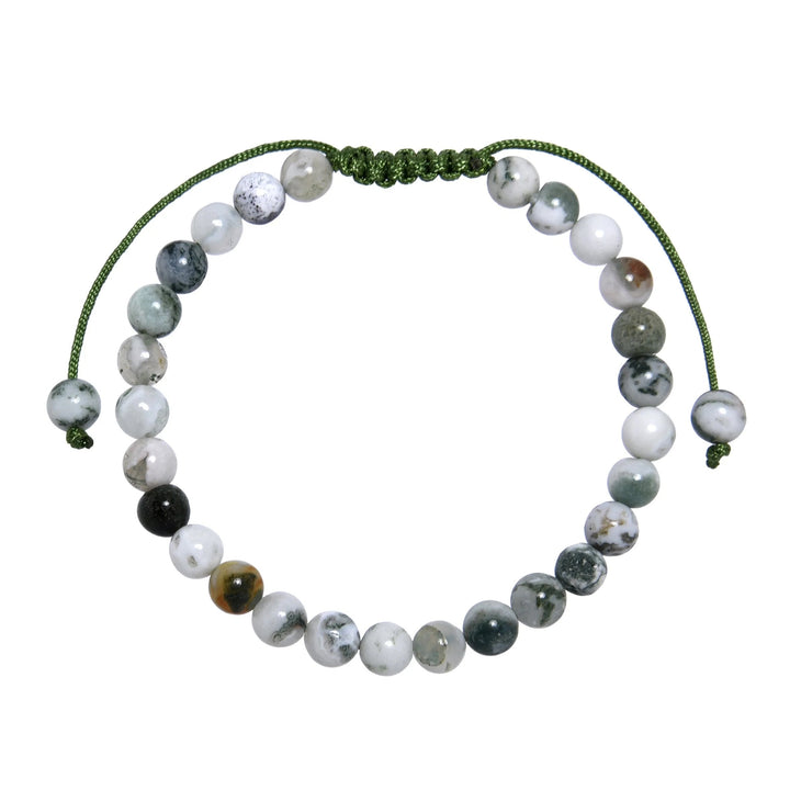 Close-up of a tree agate bracelet made with 10mm round beads with shades of green, gray, and white colors with small specks of brown, and a green pull tie style cord closure, displayed on a white background.