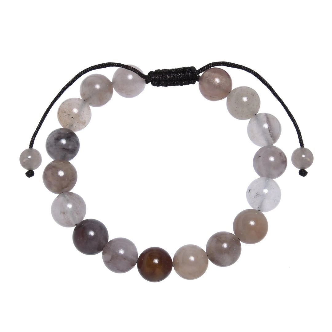 Close-up of a violet jasper bracelet made with a combination of gray, white, violet, and beige 10mm violet jasper beads, with a dark brown black pull tie style cord closure, displayed on a white background.