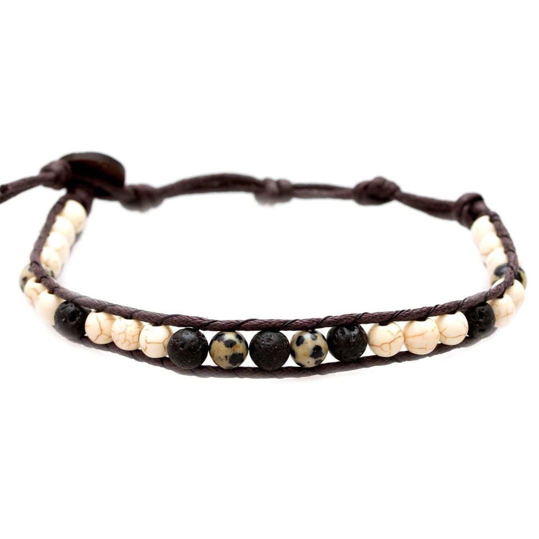 Close-up of a single wrap men's bracelet with a combination of black, white, and dark brown round stone beads, featuring an adjustable brown cotton cord and a coconut clasp, displayed on a white background.
